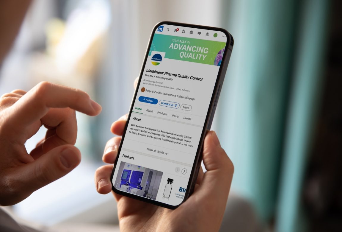 Person holding phone on bioMérieux's LinkedIn channel