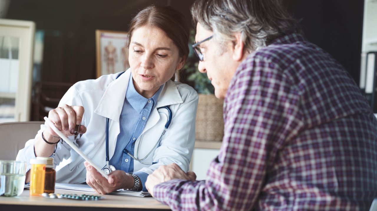 Doctor with patient in medical office